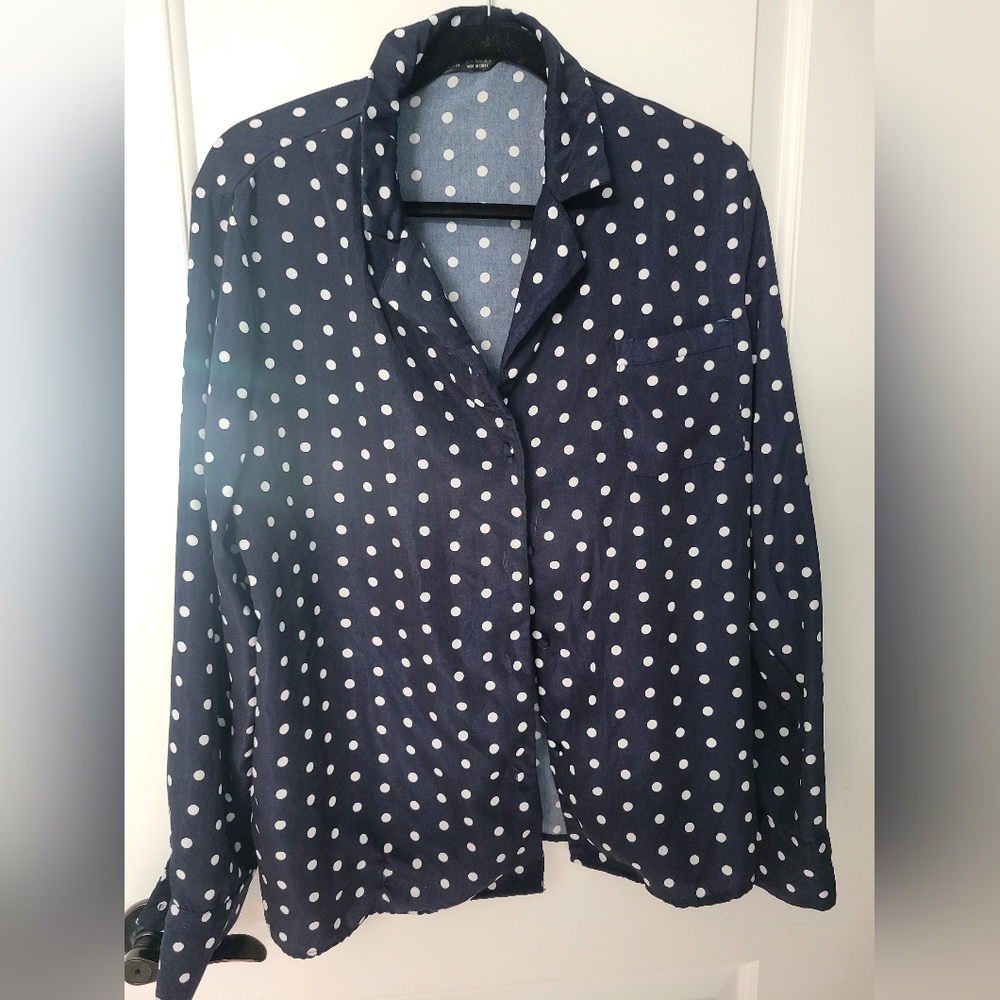 Blue and white polka dot blouse